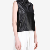 Black tops worn by a person, showing the  tops  fit