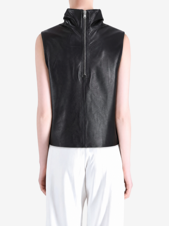 Black tops worn by a person, showing the  tops  fit