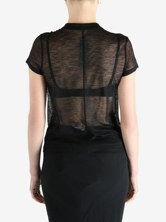 Black t-shirt worn by a person, showing the shirt's fit