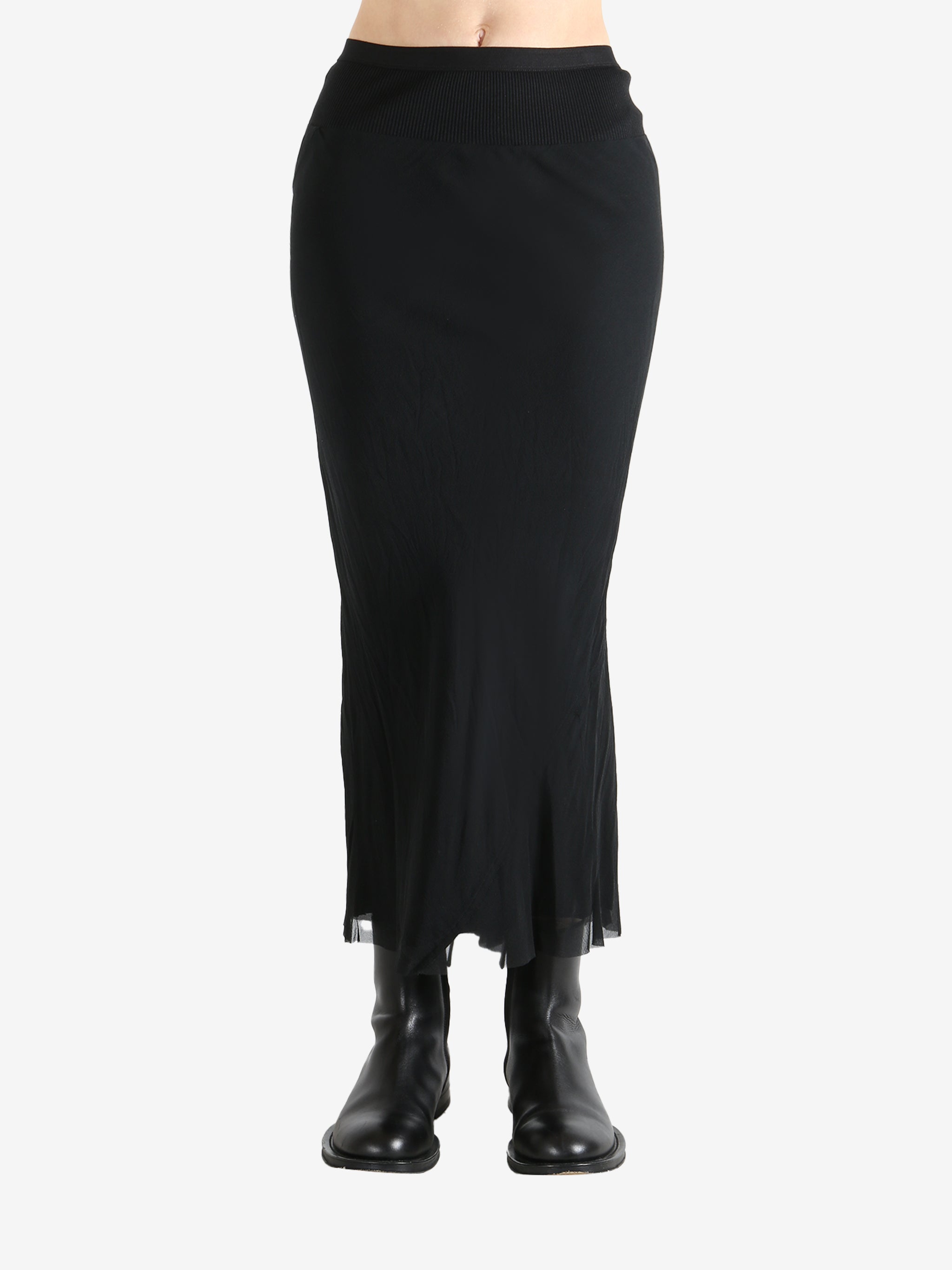 Black skirt worn by a person, showing the skirt fit