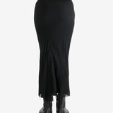 Black skirt worn by a person, showing the skirt fit