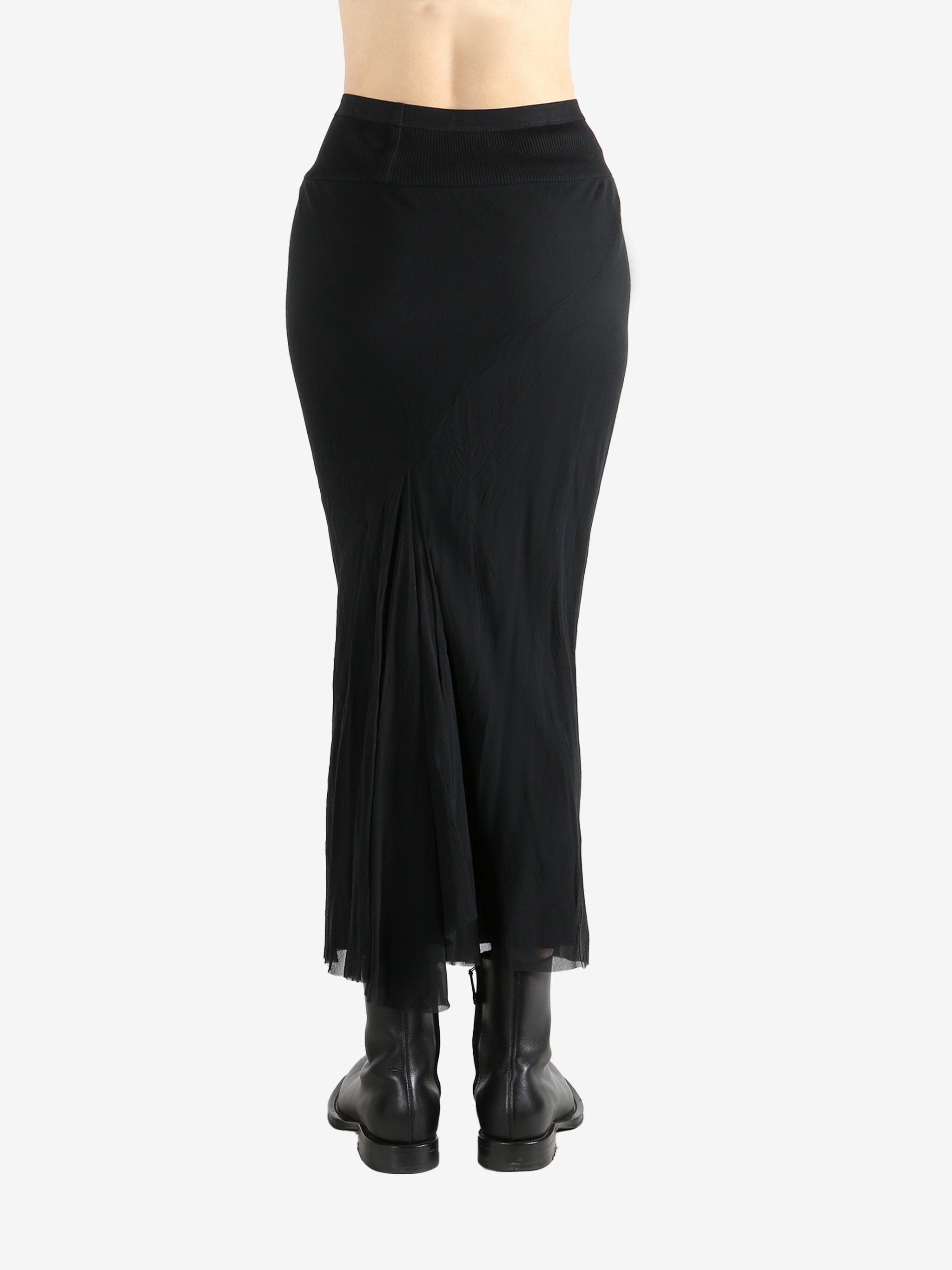 Black skirt worn by a person, showing the skirt fit