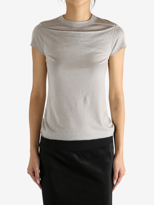 Grey t-shirt worn by a person,showing the t-shirt's fit