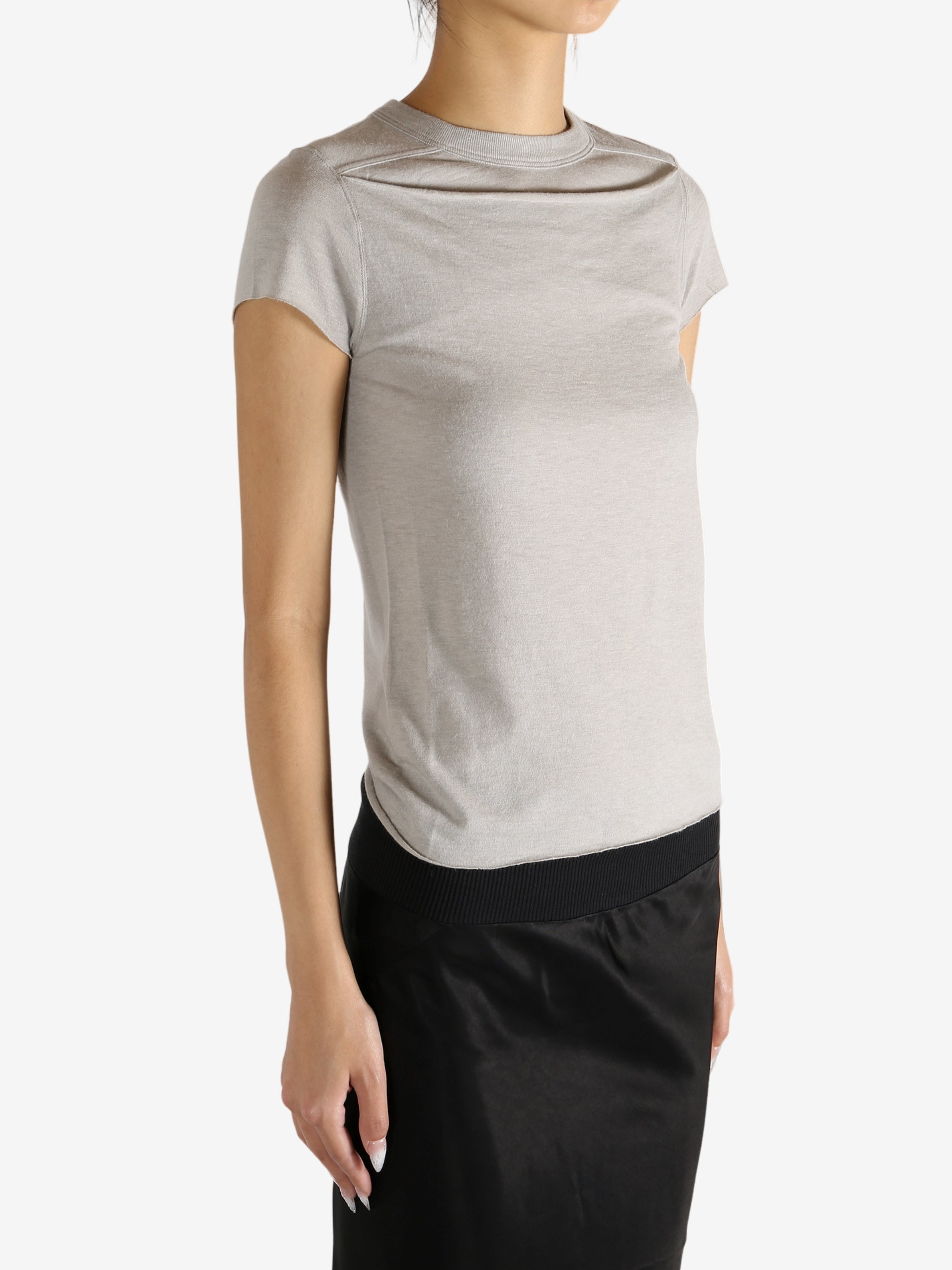 Grey t-shirt worn by a person,showing the t-shirt's fit