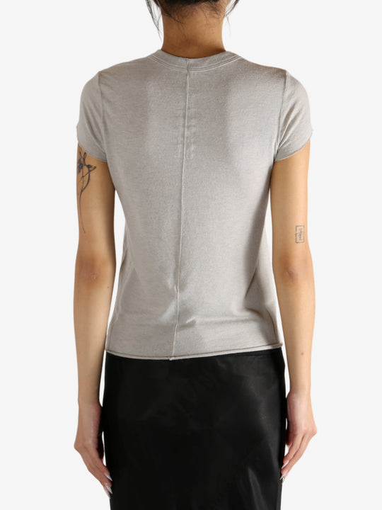 Grey t-shirt worn by a person,showing the t-shirt's fit