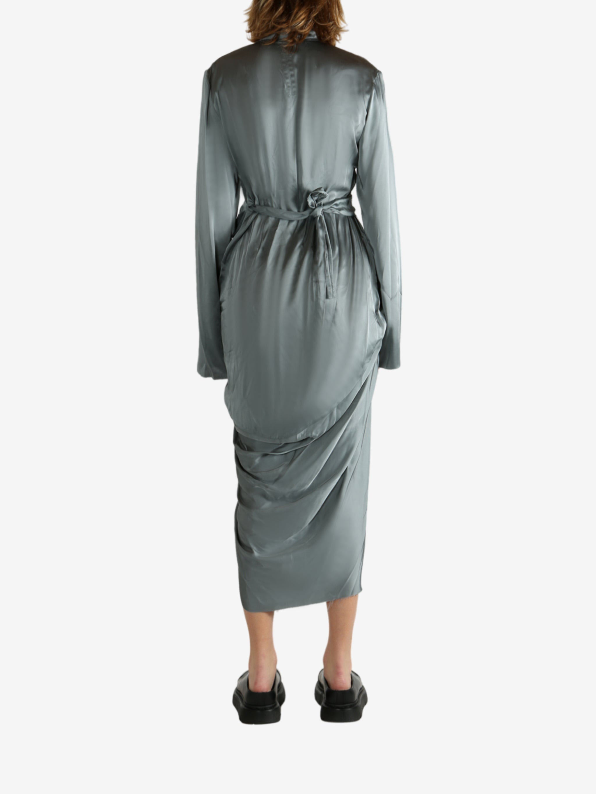 Grey dress worn by a person, showing the dreess' fit