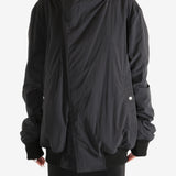 Black jacket worn by a person,showing the jacket's fit