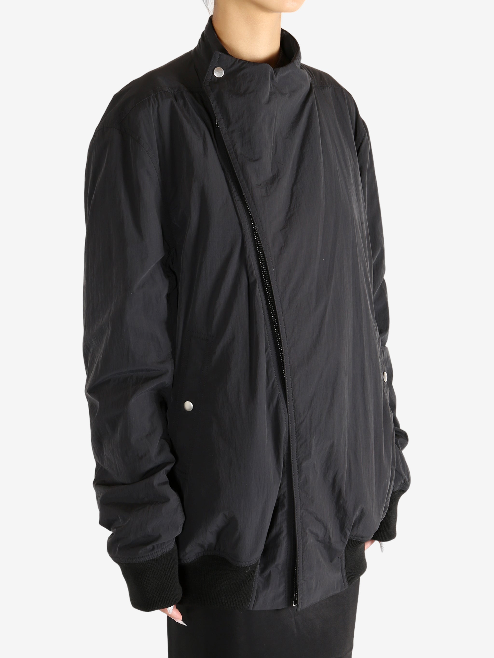 Black jacket worn by a person,showing the jacket's fit