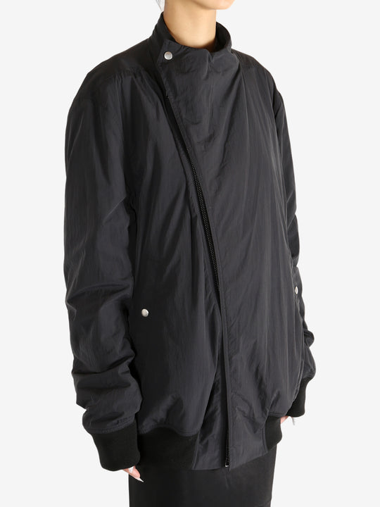 Black jacket worn by a person,showing the jacket's fit