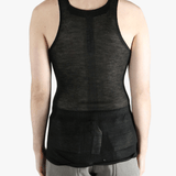 black tops worn by a person, showing the  tops fit