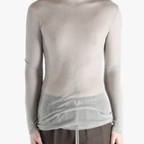 gray tops worn by a person, showing the tops fit