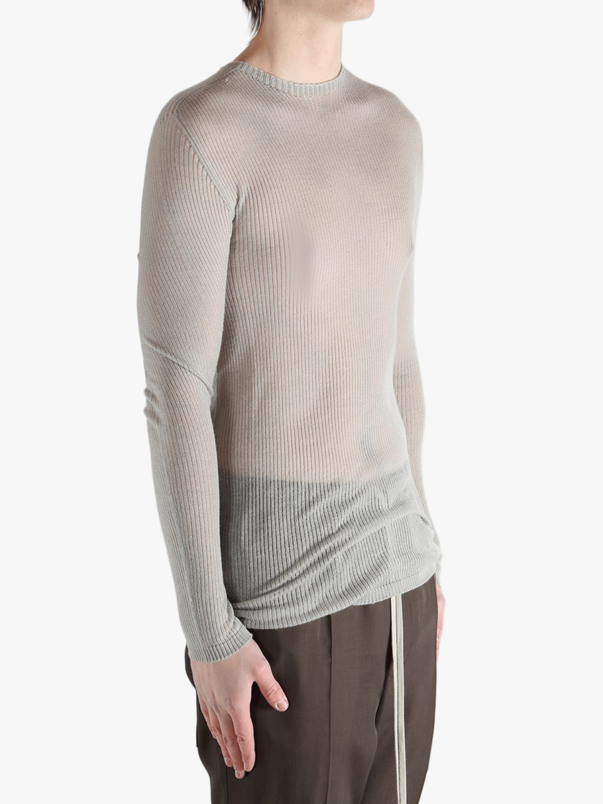 gray tops worn by a person, showing the tops fit