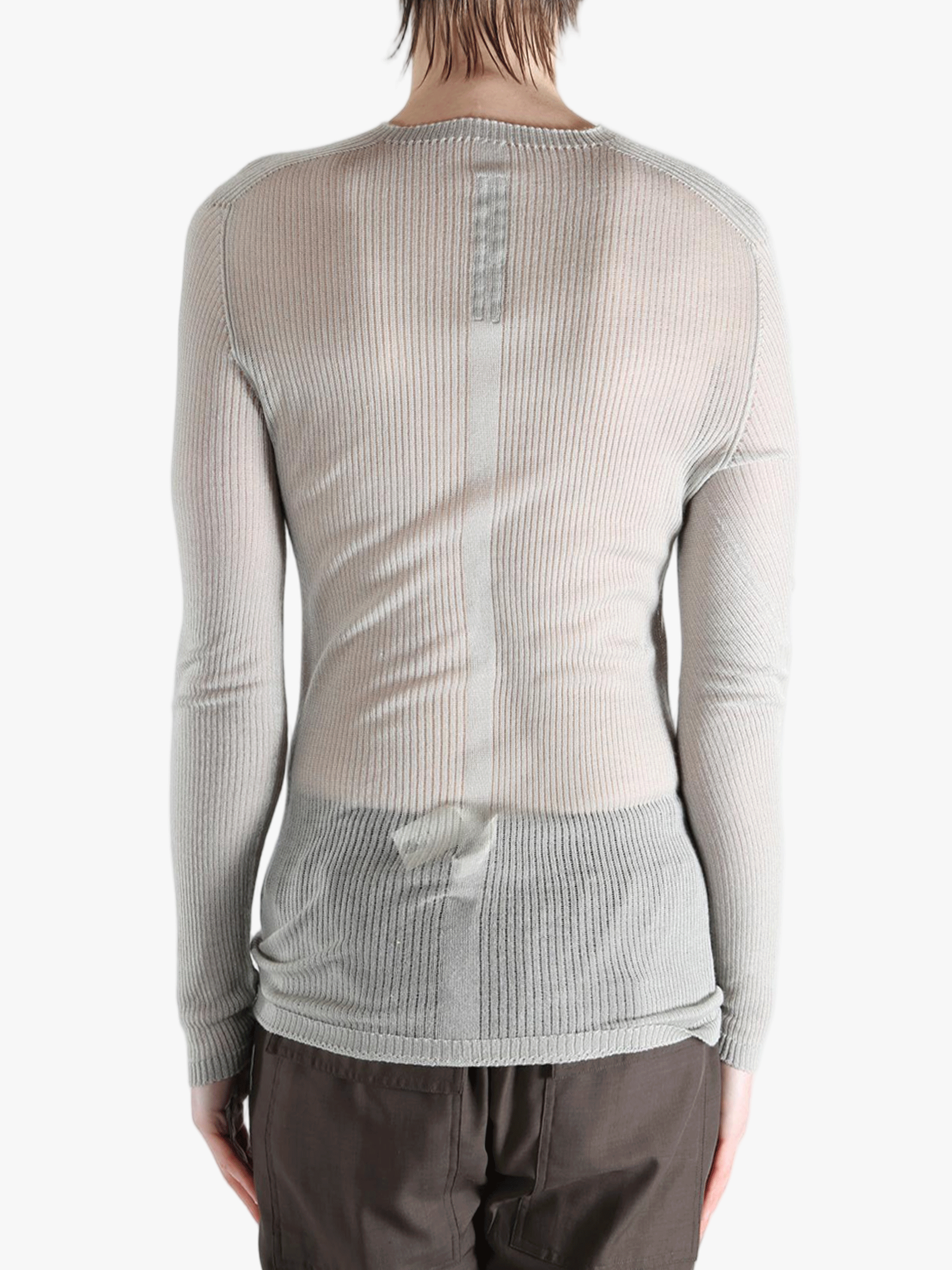 gray tops worn by a person, showing the tops fit