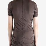 Brown t-shirt worn by a person, showing the t-shirt fit