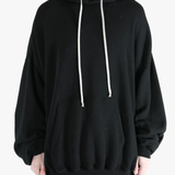 Black hoodies worn by a person, showing the hoodies fit