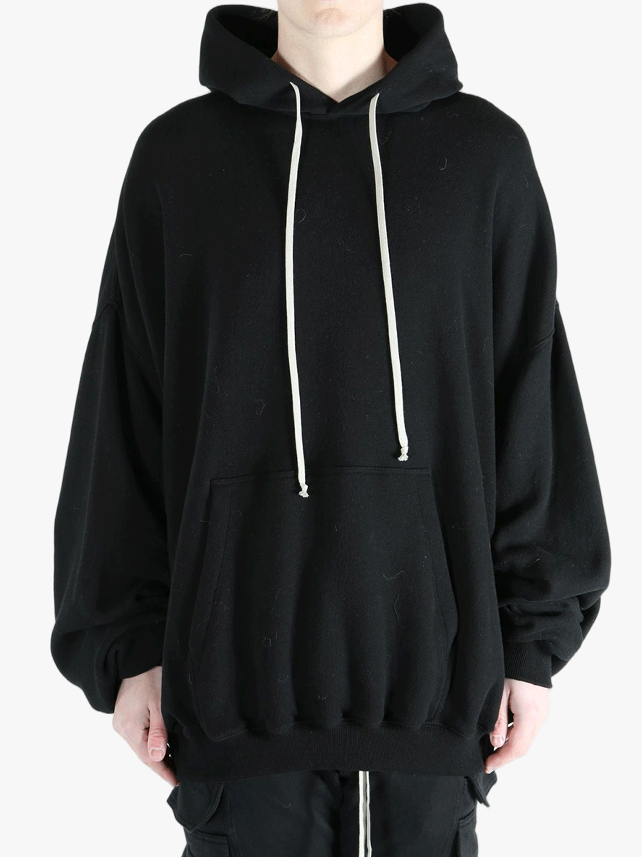 Black hoodies worn by a person, showing the hoodies fit