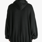 Black hoodies worn by a person, showing the hoodies fit