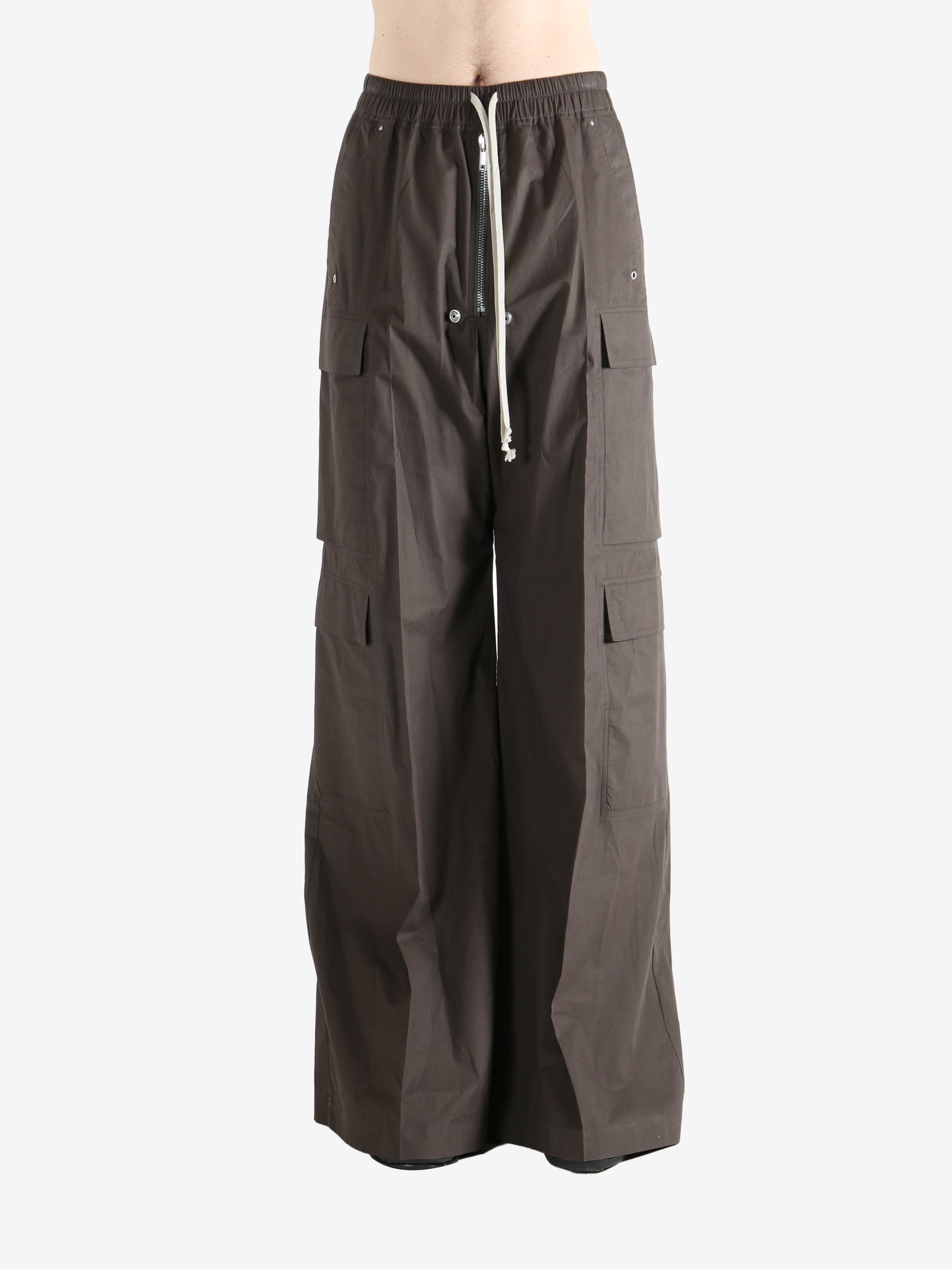 Brown pants worn by a person, showing the pants fit