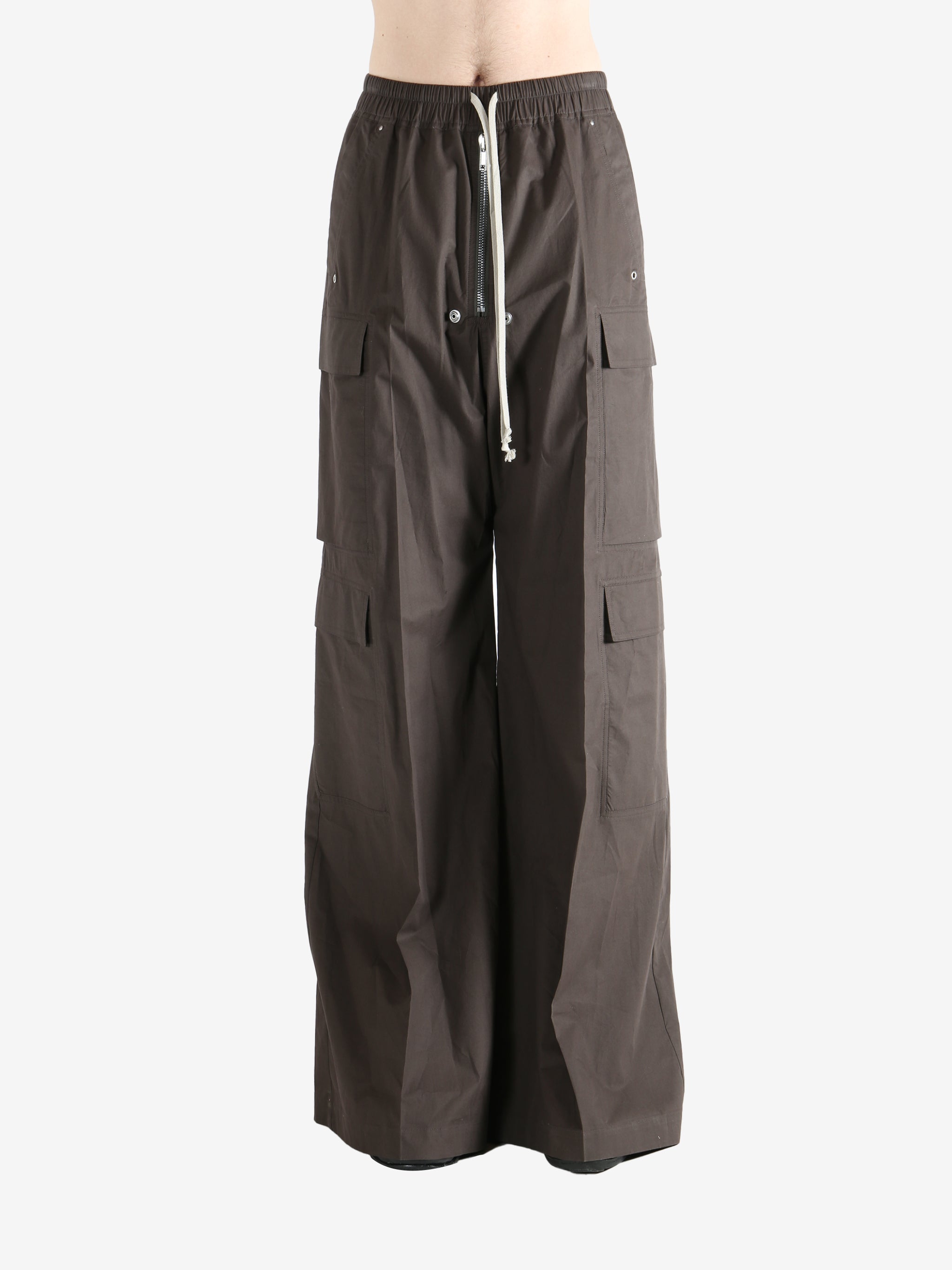 Brown pants worn by a person, showing the pants fit