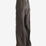 Brown pants worn by a person, showing the pants fit