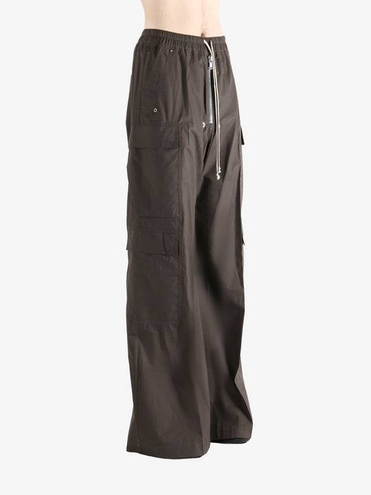 Brown pants worn by a person, showing the pants fit