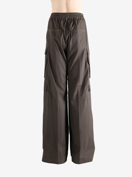 Brown pants worn by a person, showing the pants fit