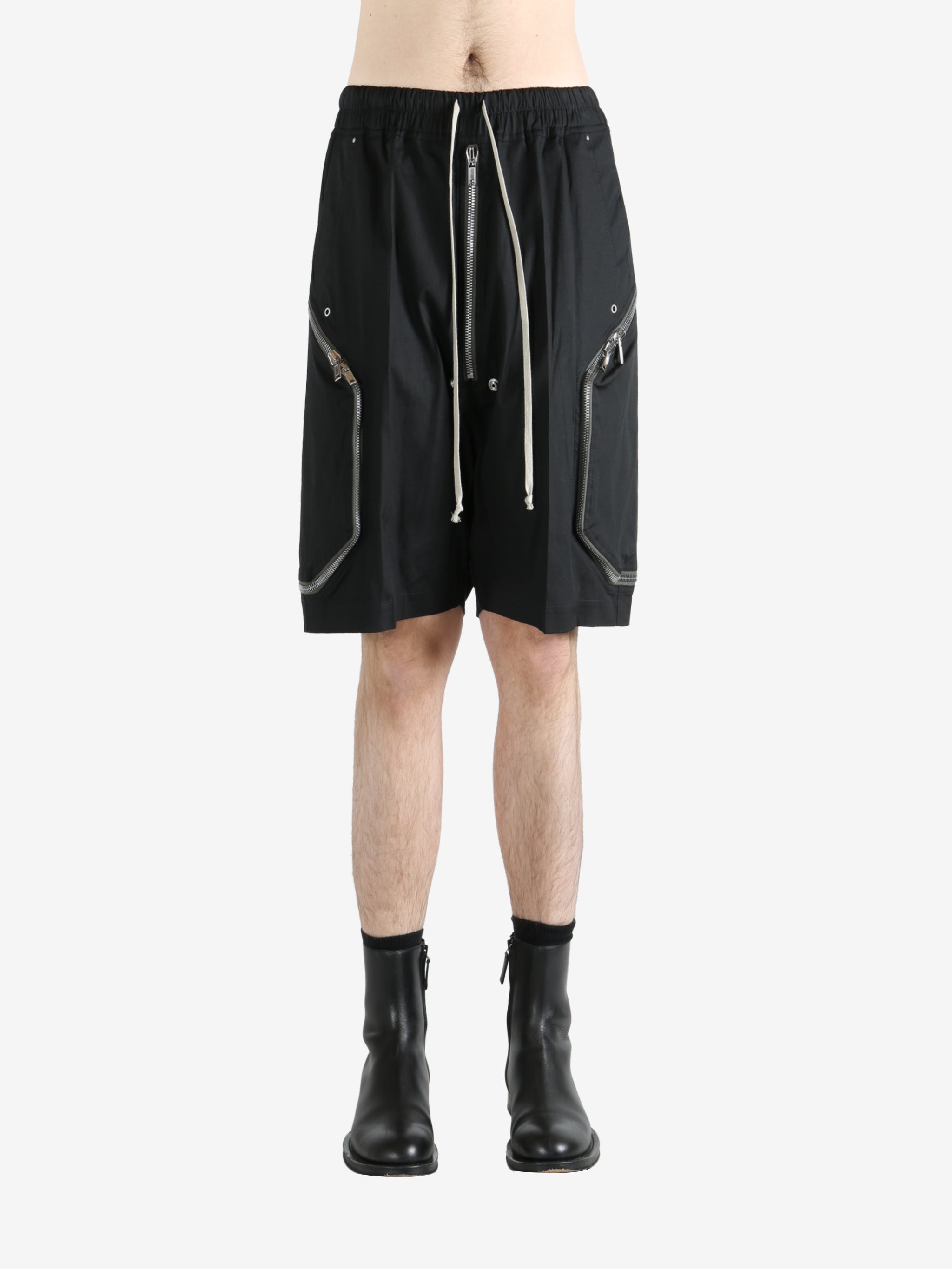 Black shorts worn by a person, showing the shorts' fit