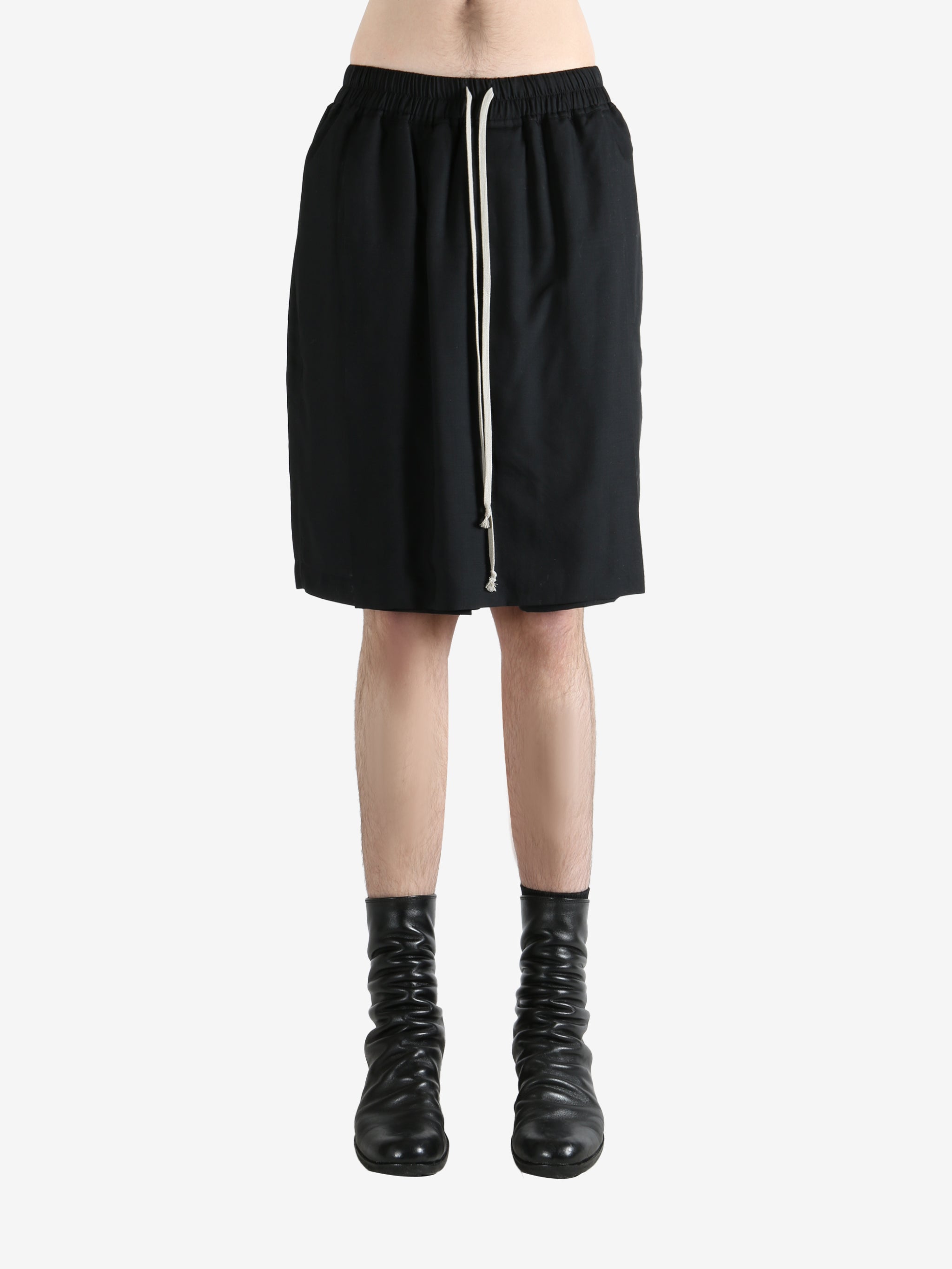 Black shorts worn by a person, showing the shorts fit