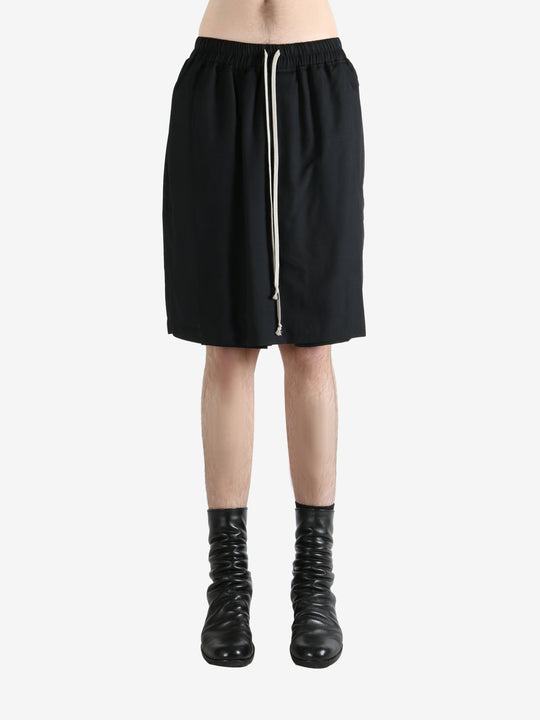 Black shorts worn by a person, showing the shorts fit