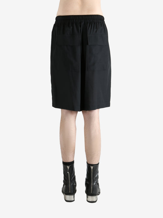 Black shorts worn by a person, showing the shorts fit