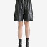 Black shorts worn by a person, showing the shorts' fit