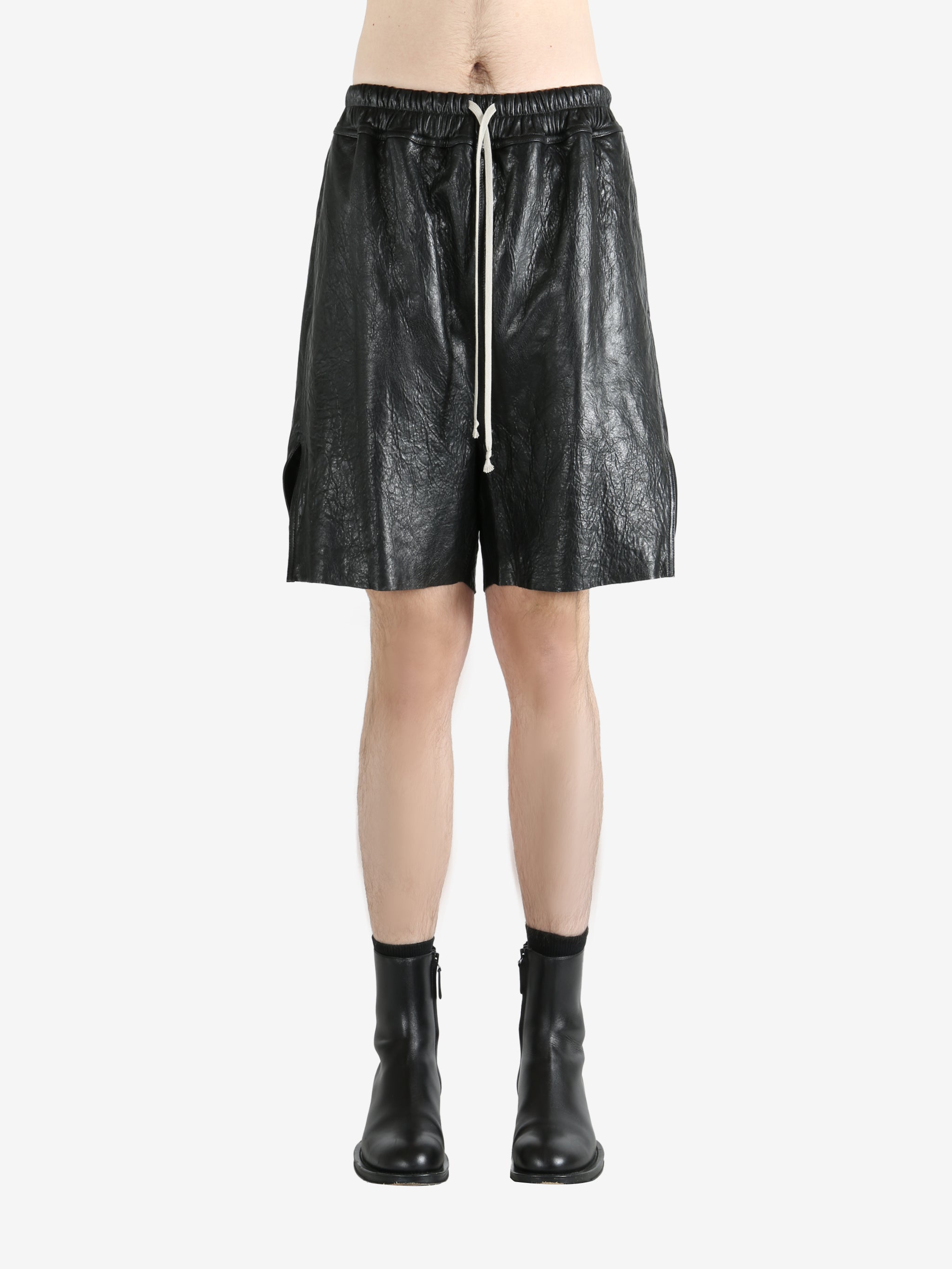 Black shorts worn by a person, showing the shorts' fit