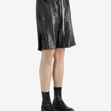 Black shorts worn by a person, showing the shorts' fit