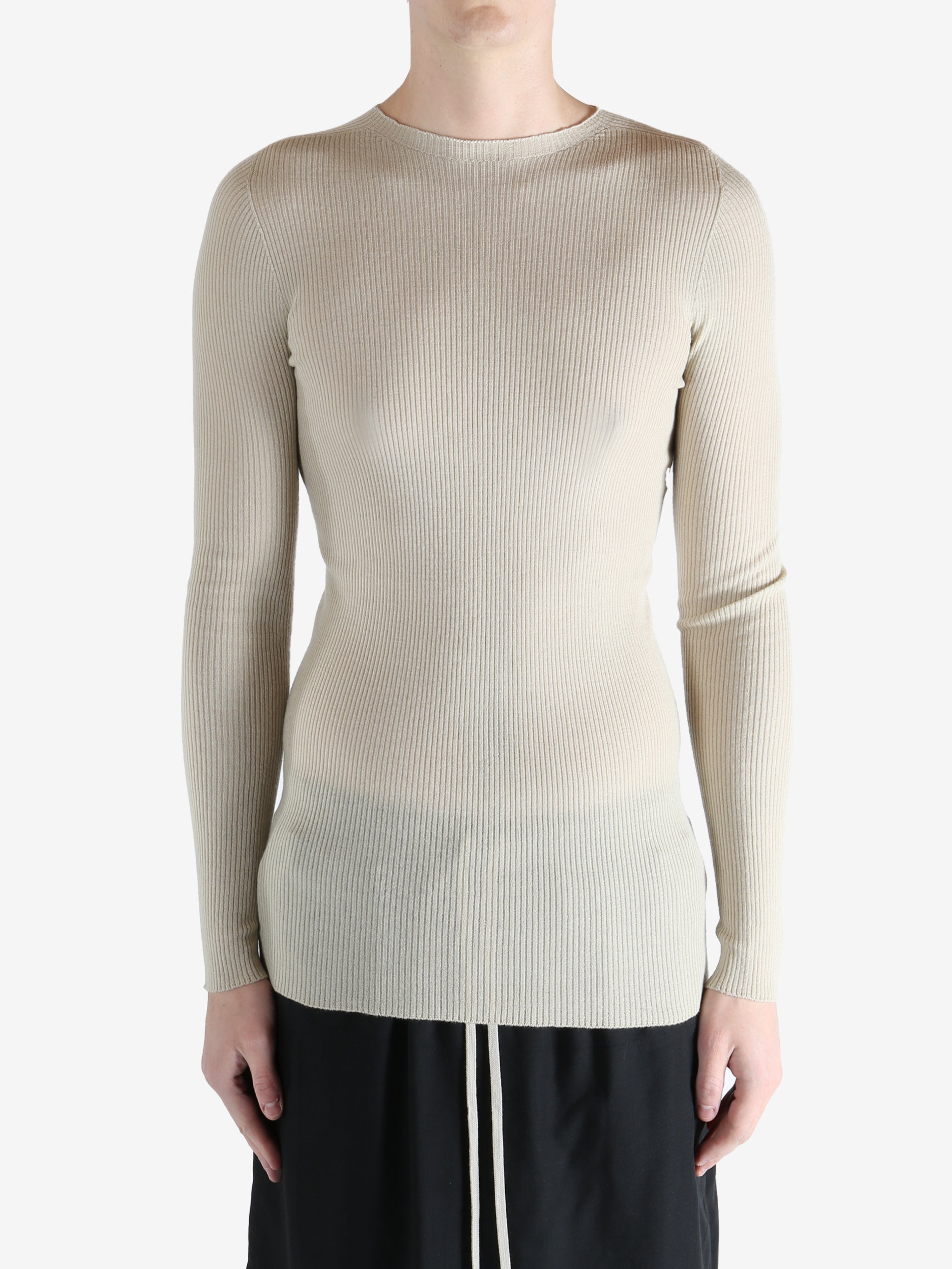 White t-shirt worn by a person, showing the t-shirt fit