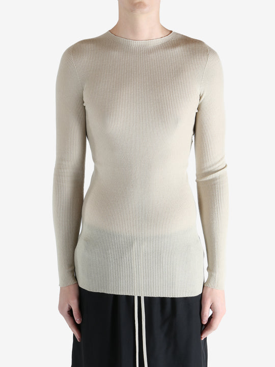 White t-shirt worn by a person, showing the t-shirt fit