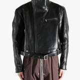 black jacket worn by a person, showing the jacket fit