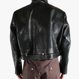 black jacket worn by a person, showing the jacket fit