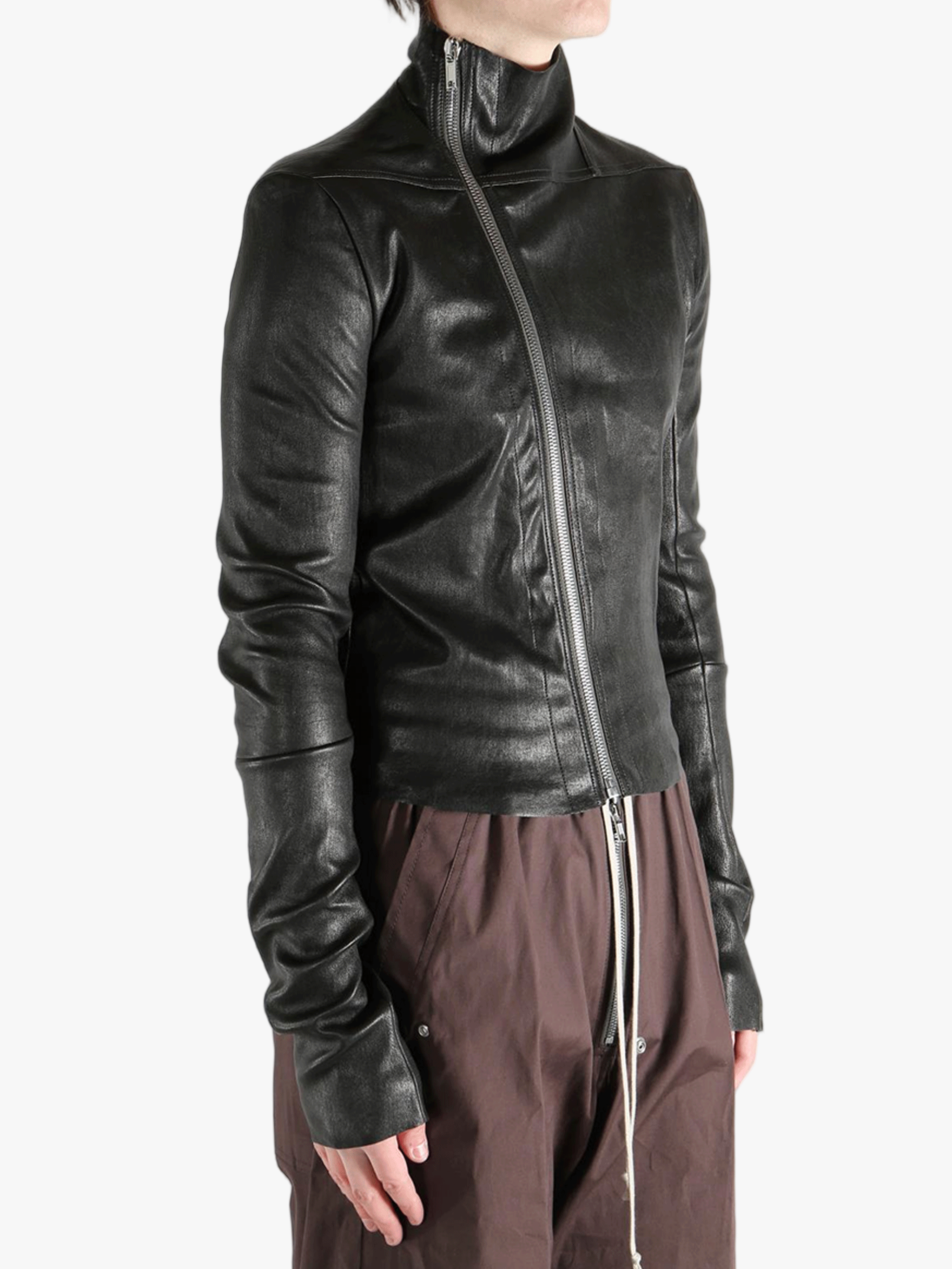 Black jacket worn by a person, showing the jacket fit