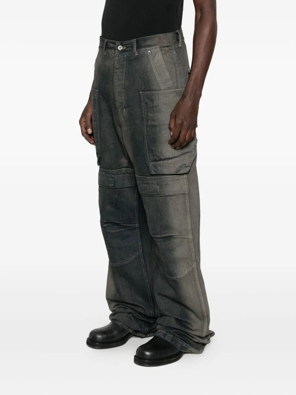 Grey jeans worn by a person, showing the jeans fit