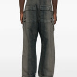 Grey jeans worn by a person, showing the jeans fit