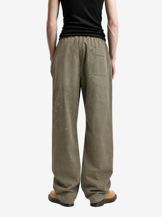 Green jeans, full body view