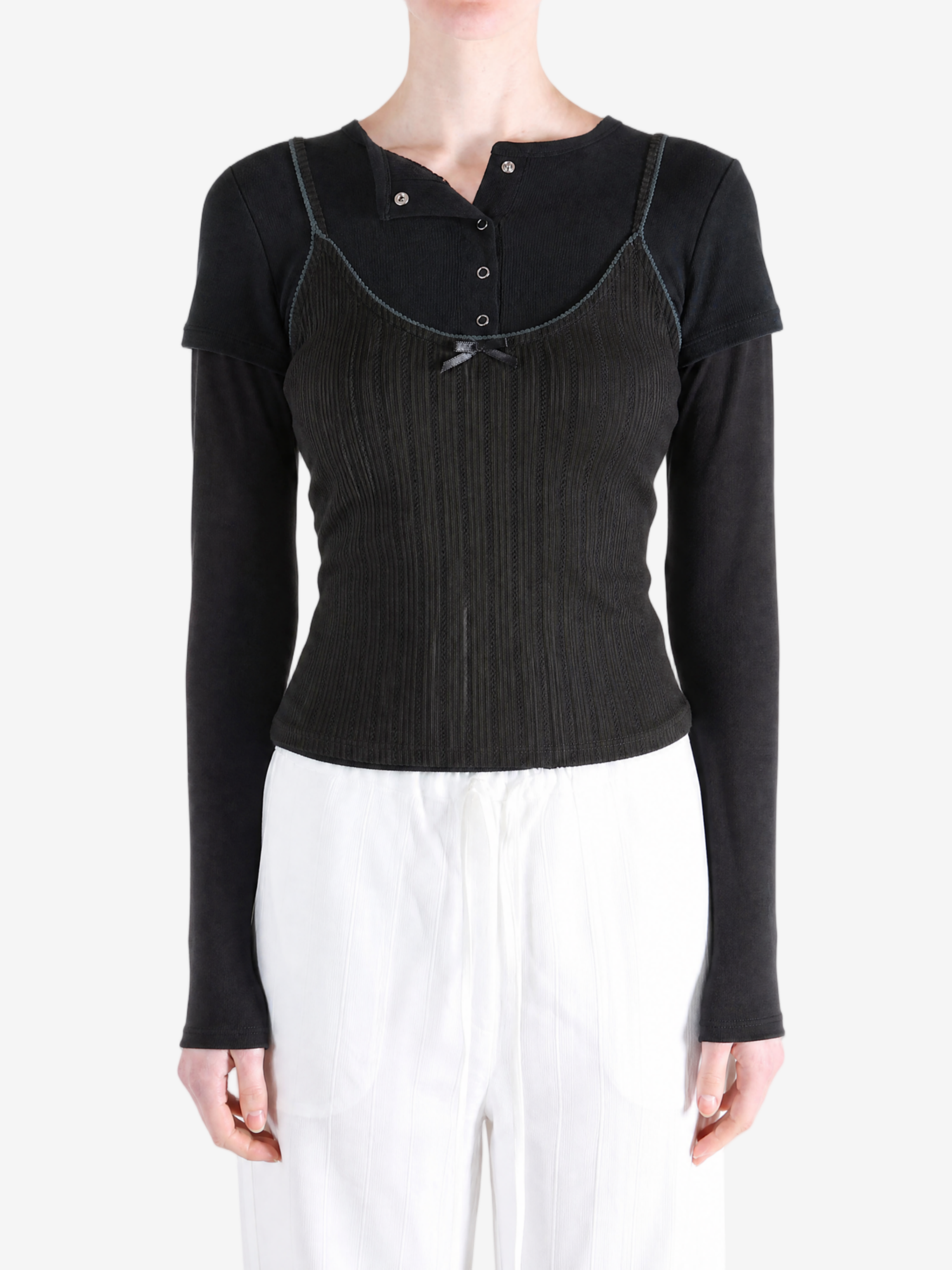 Black t-shirt worn by a person, showing the t-shirt fit