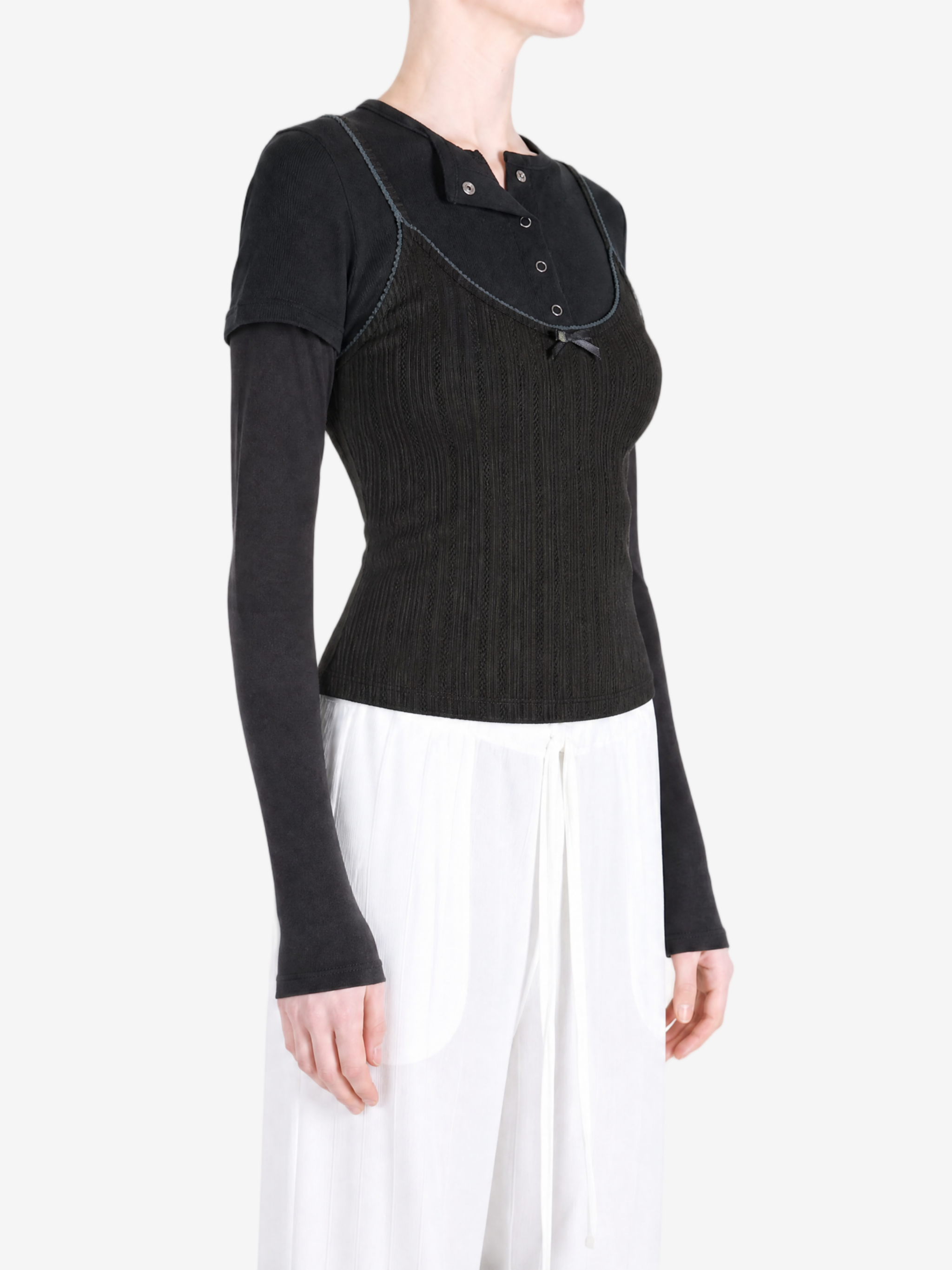 Black t-shirt worn by a person, showing the t-shirt fit