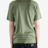 Green t-shirt worn by a person, showing the t-shirt fit
