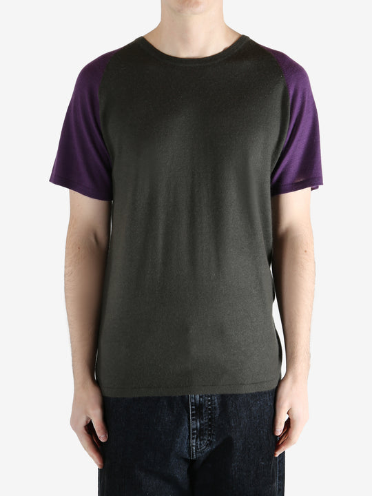 Grey t-shirt worn by a person, showing the t-shirt fit