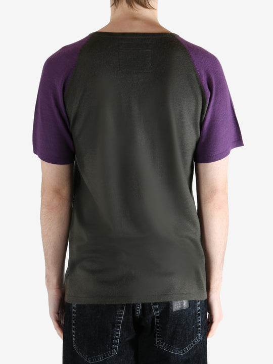 Grey t-shirt worn by a person, showing the t-shirt fit