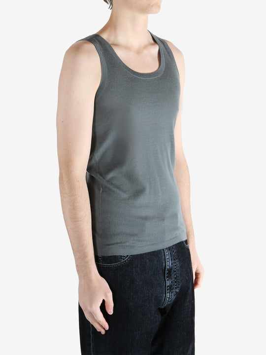 Grey top worn by a person, showing the top's fit