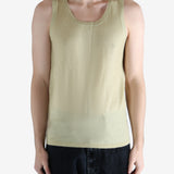 Tan top worn by a person, showing the top fit