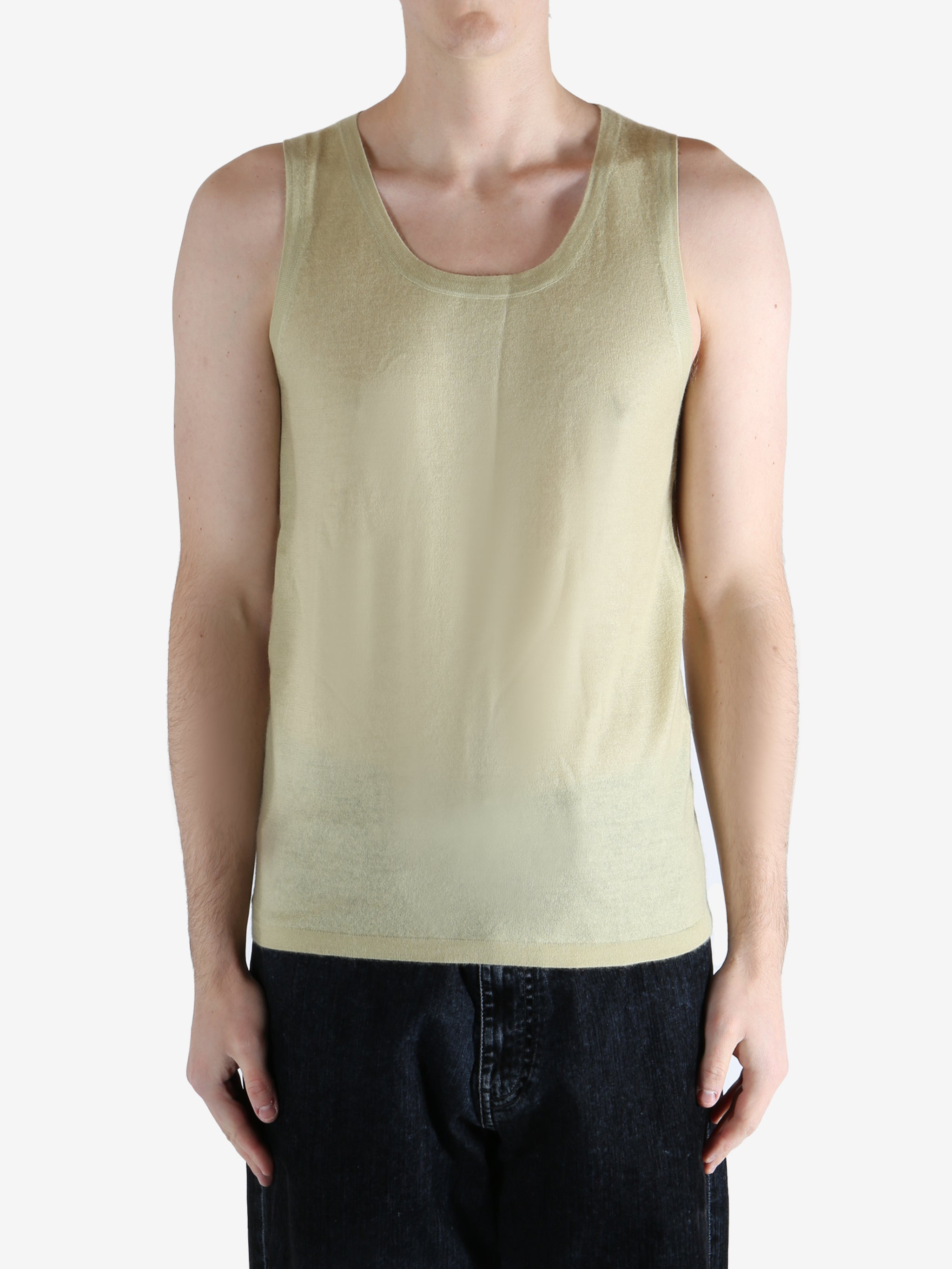 Tan top worn by a person, showing the top fit