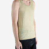 Tan top worn by a person, showing the top fit